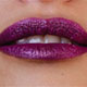 AVON Powerstay Flüssige Lippenfarbe High Voltage Spark - Burgundy Flare